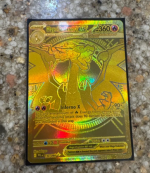 gold charizard phantasmal flames.png